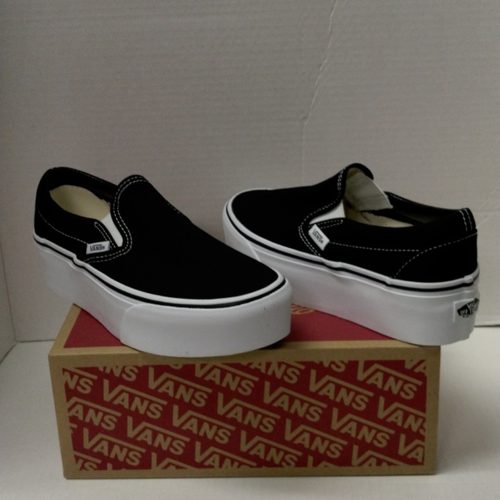 Vans Classic Slip-On Platform Sneakers in Black and White